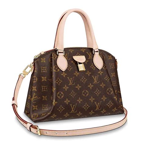 Rivoli vinyl handbag Louis Vuitton Brown in Vinyl 